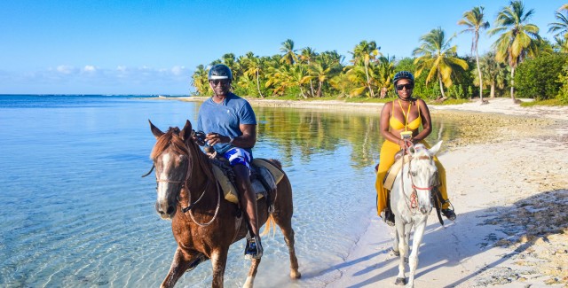 Dominican-Republic-Punta-Cana-Couple-Riding-Horse-On-Beach-id20292-Apr-28-2025 (1)